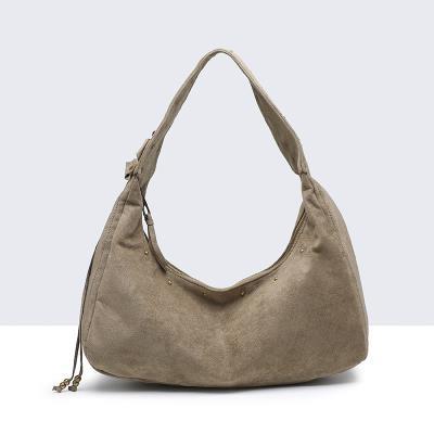 bolso antelina tachas