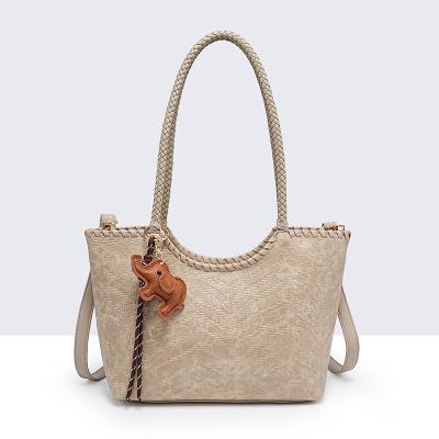 bolso trenzado llavero zara